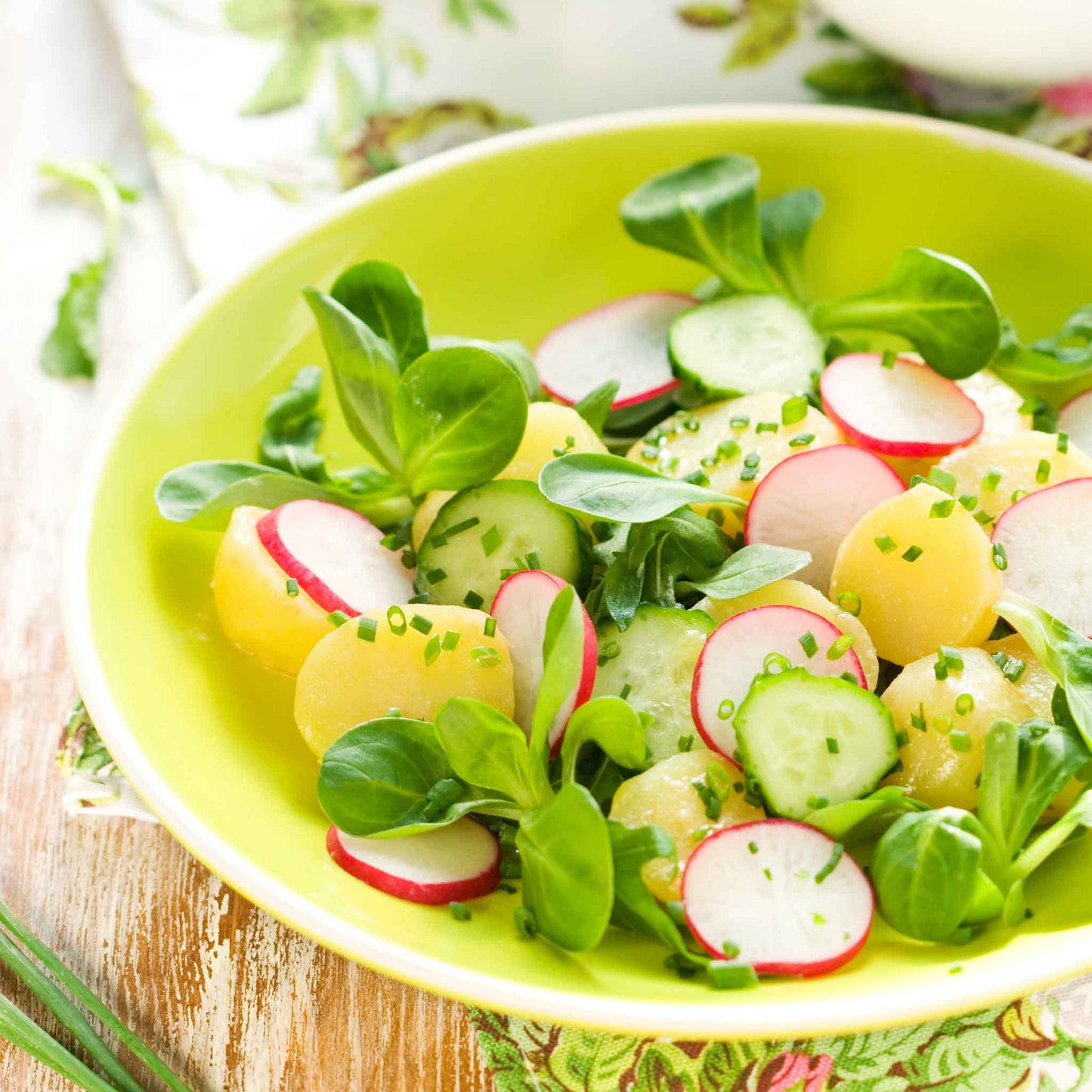 Cucumber and radish salad using Cherry Belle Radishes.
