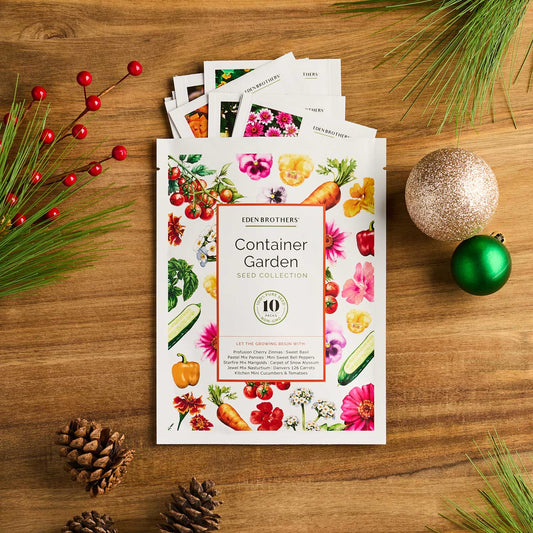 Eden Brothers Container Garden Seed Collection packaging on a wooden surface with decorative elements.
