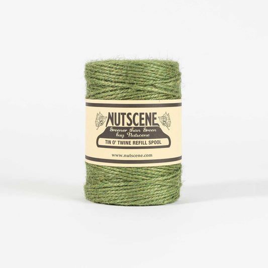 Green twine spool with Nutscene label on a white background