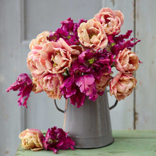 Bouquet of la belle epoque and parrot negrita tulip bundle in a metal vase.