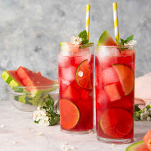 Two glasses of watermelon juice.
