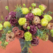 Lisianthus rosanne mix pink, purple and green blooms in a mixed bouquet arrangement.